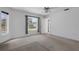 Bedroom featuring neutral carpeting and windows at 1026 Graham Rd, Venice, FL 34293