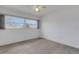 Bedroom featuring neutral carpeting and a large window at 1026 Graham Rd, Venice, FL 34293