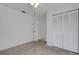 Bright bedroom with closet space and light walls, offering a serene and inviting atmosphere at 1026 Graham Rd, Venice, FL 34293
