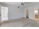 Bedroom featuring neutral carpeting and multiple doors at 1026 Graham Rd, Venice, FL 34293