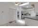Spacious kitchen with white cabinets, tiled floor and open layout with lots of natural light at 1026 Graham Rd, Venice, FL 34293