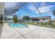 Sparkling screened-in pool with patio area, perfect for outdoor relaxation and entertainment at 1026 Graham Rd, Venice, FL 34293