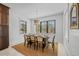 Bright dining room with a window and seating for six, perfect for intimate gatherings at 128 Fillmore Dr, Sarasota, FL 34236