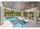 Beautiful outdoor space with a pool, spa, and elegant seating, ideal for relaxing and entertaining at 128 Fillmore Dr, Sarasota, FL 34236