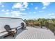 Inviting rooftop deck with comfortable seating and neighborhood views, perfect for relaxation at 128 Fillmore Dr, Sarasota, FL 34236