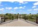 Rooftop deck overlooking a lush landscape at 128 Fillmore Dr, Sarasota, FL 34236