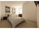Serene primary bedroom with a comfortable bed, elegant artwork, and modern bedside tables at 13046 Bayberry Way, Parrish, FL 34219