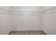 Spacious walk-in closet with wire shelving, providing ample storage and organization options for a clutter-free lifestyle at 13117 Bayberry Way, Parrish, FL 34219