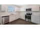 Well-appointed kitchen with stainless steel appliances, ample cabinet space, and modern fixtures for a contemporary feel at 13117 Bayberry Way, Parrish, FL 34219