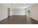 Bright living room with sliding glass doors providing access to the outdoors and filling the space with natural light at 13117 Bayberry Way, Parrish, FL 34219