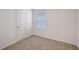 Carpeted bedroom with natural light, white walls, and a window with blinds at 13136 Bayberry Way, Parrish, FL 34219