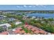 The neighborhood location with canals nearby and an excellent position is highlighted in this aerial view at 139 Vista Hermosa Circle, Sarasota, FL 34242