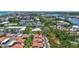 Aerial view of the condo showcasing the nearby waterway, convenient street access, and community landscaping at 139 Vista Hermosa Circle, Sarasota, FL 34242