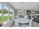 Lovely dining area with natural light that connects to the living room at 139 Vista Hermosa Circle, Sarasota, FL 34242