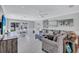 Bright and airy living room featuring neutral tones, comfortable seating, and stylish artwork at 139 Vista Hermosa Circle, Sarasota, FL 34242