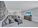 Spacious living area with a media center and seamless transition to the kitchen at 139 Vista Hermosa Circle, Sarasota, FL 34242