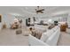 Spacious, open-concept area connecting the living room, dining area, and kitchen, ideal for a modern lifestyle at 15315 Derna Ter, Bradenton, FL 34211
