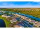 Extensive aerial shot of a Primary-planned community with ponds and waterways at 17128 Ranchside Pl, Lakewood Ranch, FL 34211