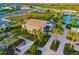 Attractive home with landscaped surroundings, paver driveway and walkway, and a covered front porch at 17128 Ranchside Pl, Lakewood Ranch, FL 34211