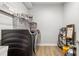 A well-equipped laundry room with modern washer and dryer and ample storage at 17128 Ranchside Pl, Lakewood Ranch, FL 34211