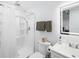 Clean bathroom featuring a walk-in shower, lighted mirror, and sleek, minimalist design at 1871 Prospect St, Sarasota, FL 34239