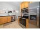 Bright kitchen featuring stainless steel appliances and ample counter space for cooking at 1871 Prospect St, Sarasota, FL 34239