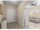 Welcoming entryway with tile flooring and a view into the light-filled living area at 2070 Crystal Lake Trl, Bradenton, FL 34211
