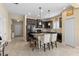 Spacious kitchen with dark cabinets, granite countertops, and stainless steel appliances at 2070 Crystal Lake Trl, Bradenton, FL 34211
