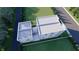 Aerial view of a modern home with flat roofs, a white picket fence and a lush green lawn at 2144 5Th N Ave, St Petersburg, FL 33713