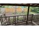 View of large lot with wood fence from covered back porch at 2230 50Th N Ave, St Petersburg, FL 33714