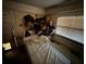 Bedroom with bed, dresser and exterior door at 2230 50Th N Ave, St Petersburg, FL 33714