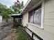 Exterior view of the home showing the covered porch at 2230 50Th N Ave, St Petersburg, FL 33714