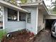 This home has an enclosed porch and driveway at 2230 50Th N Ave, St Petersburg, FL 33714