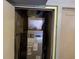 Image shows the installed Carrier furnace inside the home, with visible ductwork and utility connections at 2230 50Th N Ave, St Petersburg, FL 33714