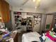 A kitchen with tile floors, wood cabinets, and basic appliances at 2230 50Th N Ave, St Petersburg, FL 33714