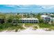 Beachside condo with easy access to the water, showcasing its proximity to the sand and Gulf at 2310 Gulf N Dr # 104, Bradenton Beach, FL 34217