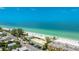 Aerial view showing the condo's close proximity to the beach, traffic, and Gulf of Mexico at 2310 Gulf N Dr # 104, Bradenton Beach, FL 34217