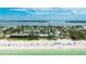Gorgeous aerial view of beachfront condo with beach access and breathtaking gulf views at 2310 Gulf N Dr # 104, Bradenton Beach, FL 34217