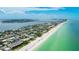Expansive aerial view showcasing the condo's location with beach access to Gulf of Mexico at 2310 Gulf N Dr # 104, Bradenton Beach, FL 34217