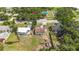 Aerial view of a modest residence near a park with vibrant playground equipment at 2558 Hawthorne St, Sarasota, FL 34239