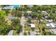 Beautiful aerial view highlights neighborhood homes near community park and pool in lush green location at 2558 Hawthorne St, Sarasota, FL 34239