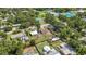 Charming neighborhood view near community parks, pools and recreation center in lush green landscape at 2558 Hawthorne St, Sarasota, FL 34239