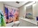 Well-lit bathroom with shower-tub combo, vanity with granite counters, and modern fixtures at 2763 Woodgate Ln # 211, Sarasota, FL 34231