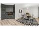 Dining room features a modern fireplace, chandelier, zebra rug, and seating for six at 2912 51St E St, Bradenton, FL 34208
