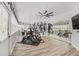 Spacious home gym equipped with various exercise bikes, mirrored wall, and natural light at 2912 51St E St, Bradenton, FL 34208