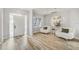 Inviting foyer featuring stylish seating, artwork, and natural light, creating a welcoming atmosphere at 2912 51St E St, Bradenton, FL 34208
