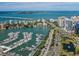 Stunning aerial view of Sarasota Bay featuring a marina, cityscape, and bridge in beautiful Florida at 2933 Michigan St, Sarasota, FL 34237