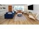 Bright living room with a modern design, stylish furniture, and hardwood floors at 2933 Michigan St, Sarasota, FL 34237
