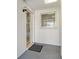 Welcoming entrance showcasing a sleek door and a well-lit entryway at 3276 Westford Ln, #117,, Sarasota, FL 34231