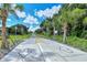 Marked Legacy Trail path with directional arrows and safety features for cyclists and pedestrians at 3276 Westford Ln, #117,, Sarasota, FL 34231